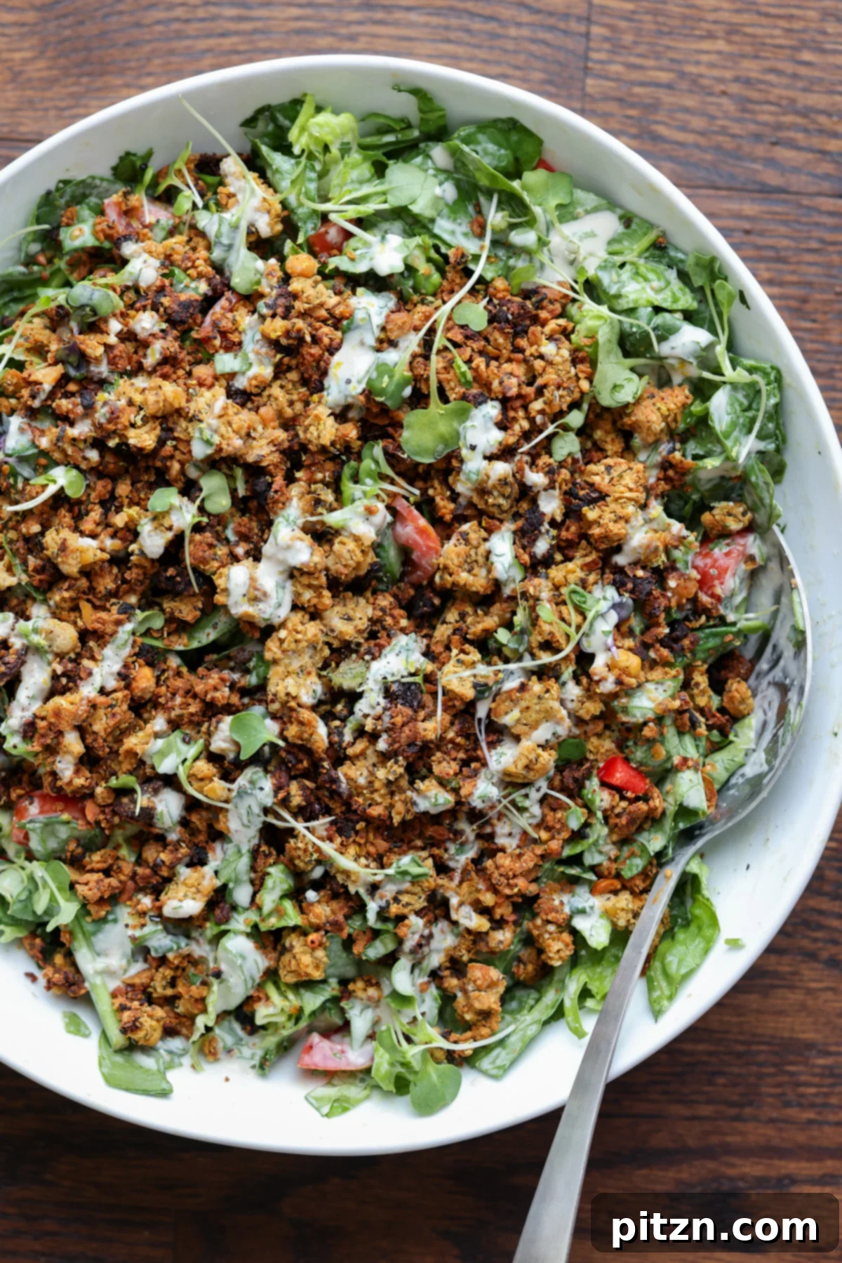 Sun-Drenched Spinach Salad with Zesty Olive-Chickpea Crunch 2 A vibrant, fully loaded summer spinach salad with a crispy chickpea and olive crumble, drizzled with creamy tahini lemon dressing, perfect for a hot weather dinner.