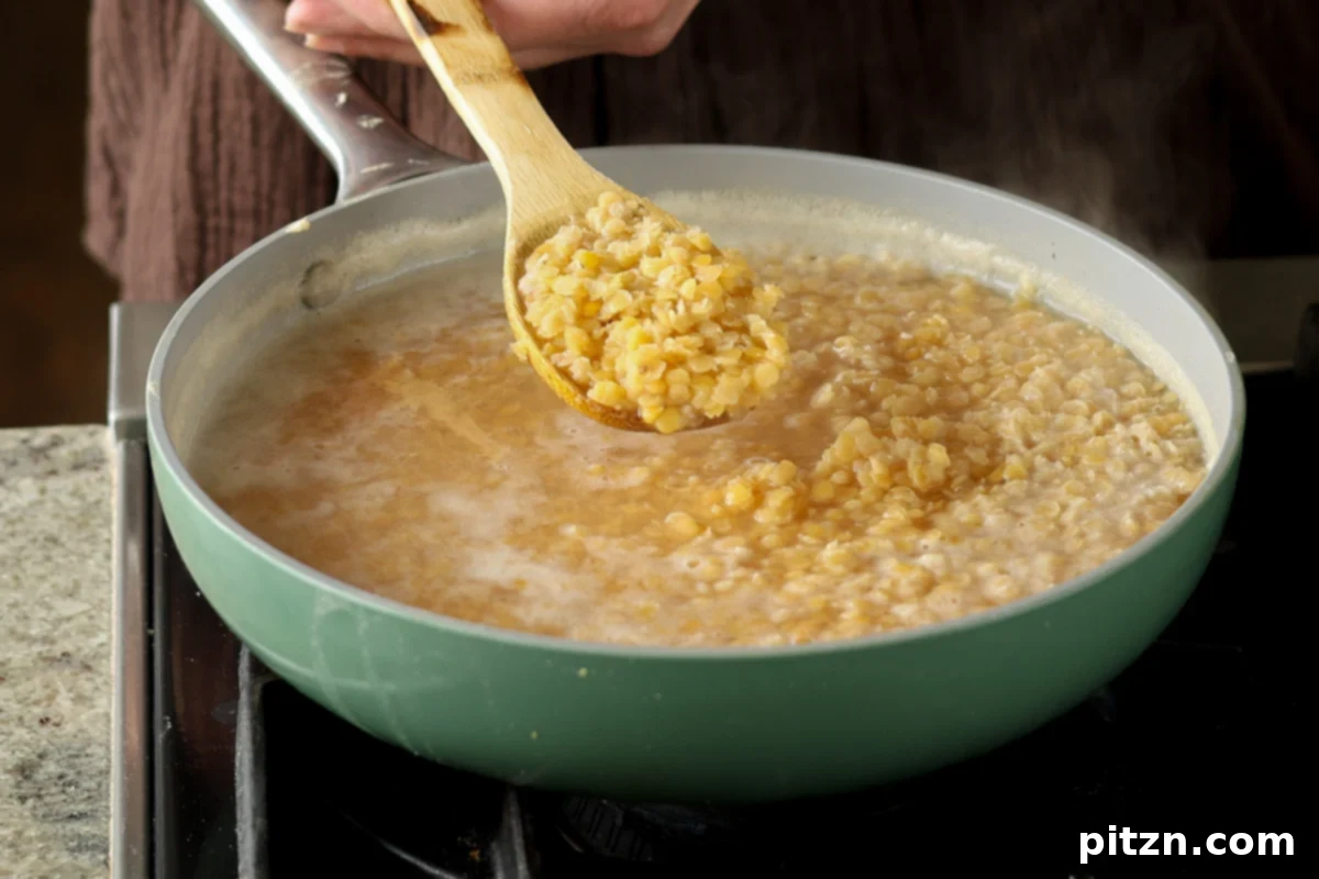 Lentil Protein World Tour Mix 12 Cooked split red lentils, prepared to an al dente texture for the trail mix.