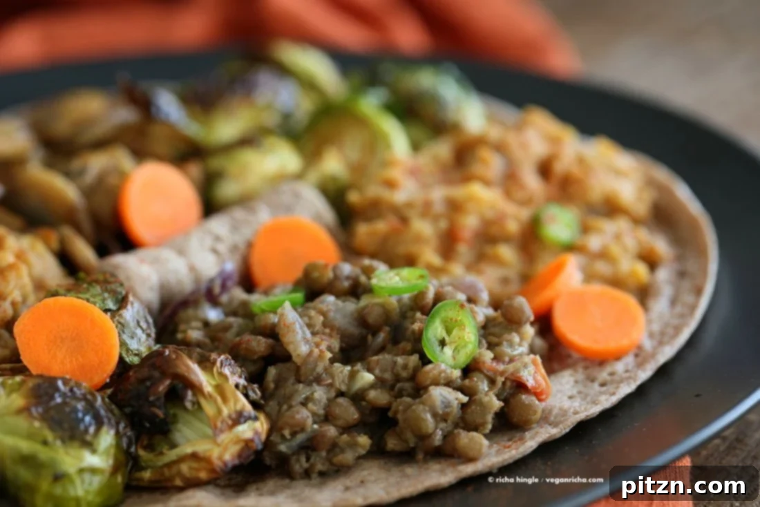 Ethiopian lentil stew (Ye'difin Misser Alicha) served with Injera.