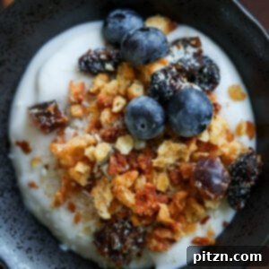 Close-up of a bowl of yogurt topped with red lentil granola