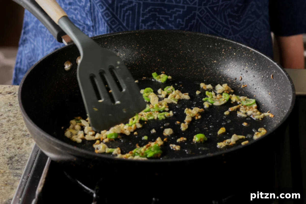 Crispy Vegan 555 Chicken Bites 21 Aromatics, including garlic and ginger, perfectly cooked in the pan.