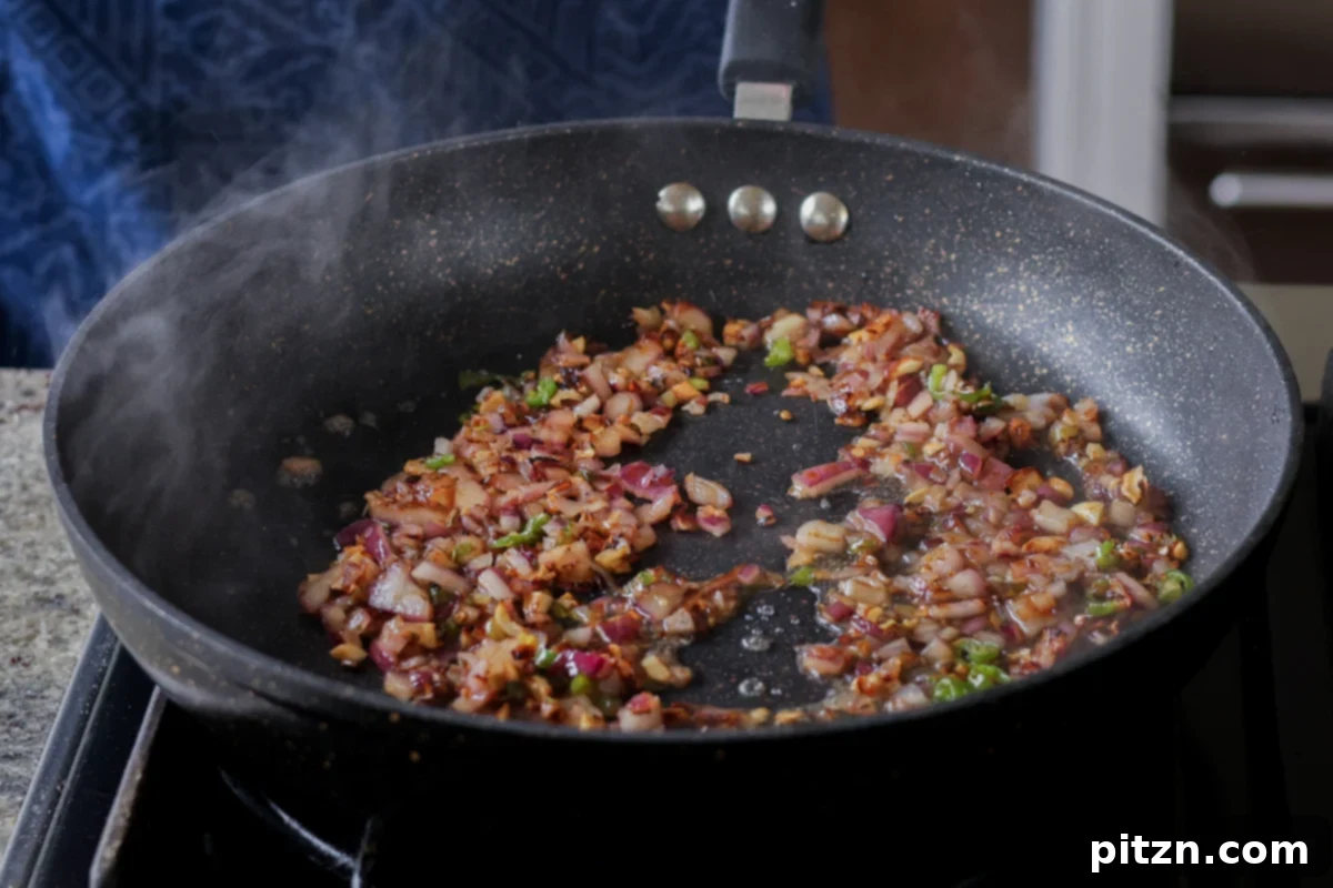 Crispy Vegan 555 Chicken Bites 23 Perfectly cooked and softened red onions in the pan.