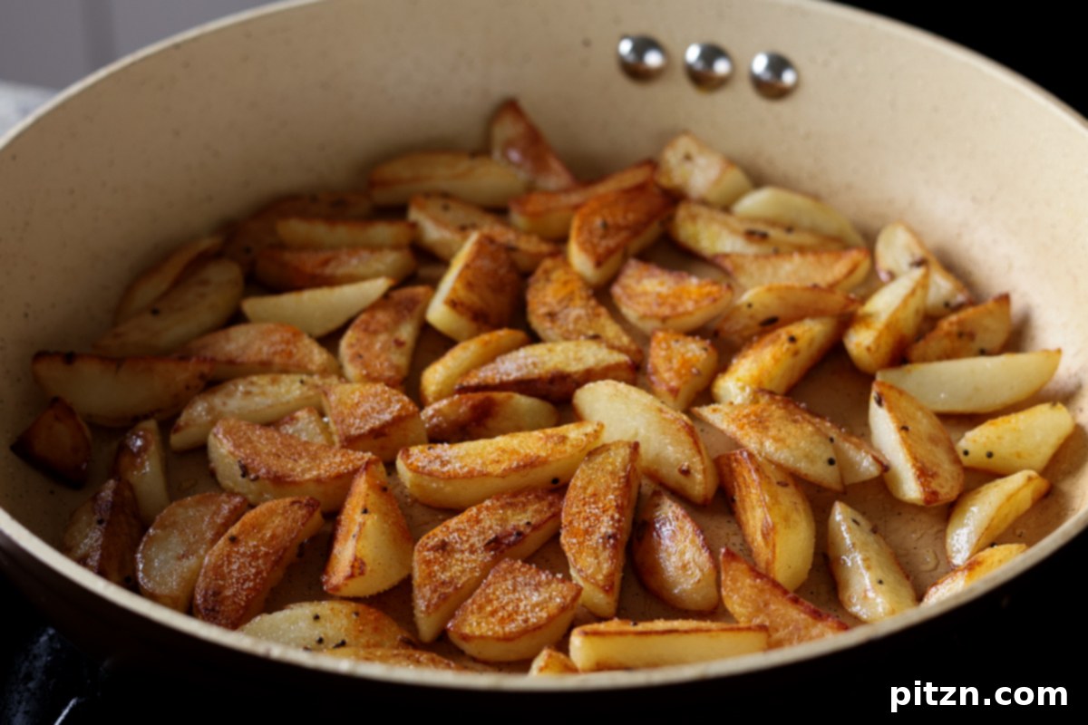 cooked potatoes in the pan