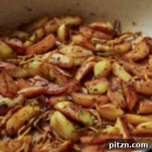 side view of Nepali aloo in the pan after cooking