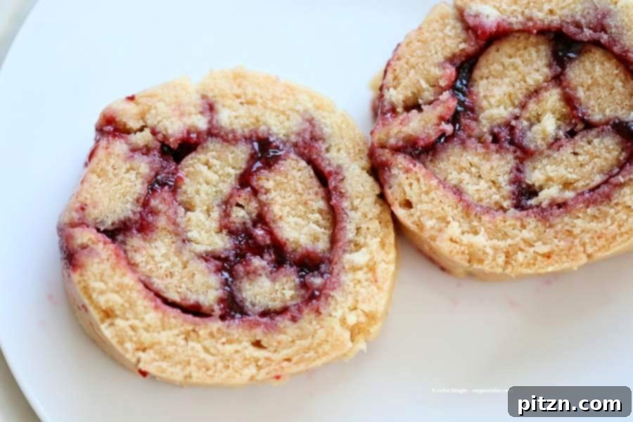 Vegan Swiss roll with Vegan Yellow cake and fruit preserves. Easy Swiss roll Cake | Vegan Richa