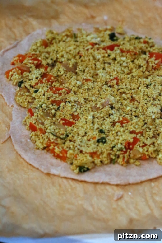 Pizza crust topped with hemp tofu scramble