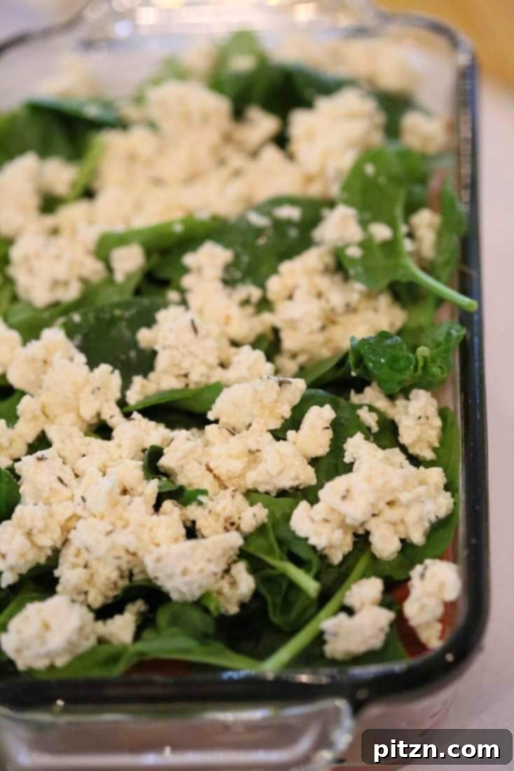 Cozy Vegan Veggie Lasagna for Two 7 A vibrant layer of noodles, abundant sauce, fresh, healthy greens, and creamy tofu thyme ricotta, adding depth and nutrition.