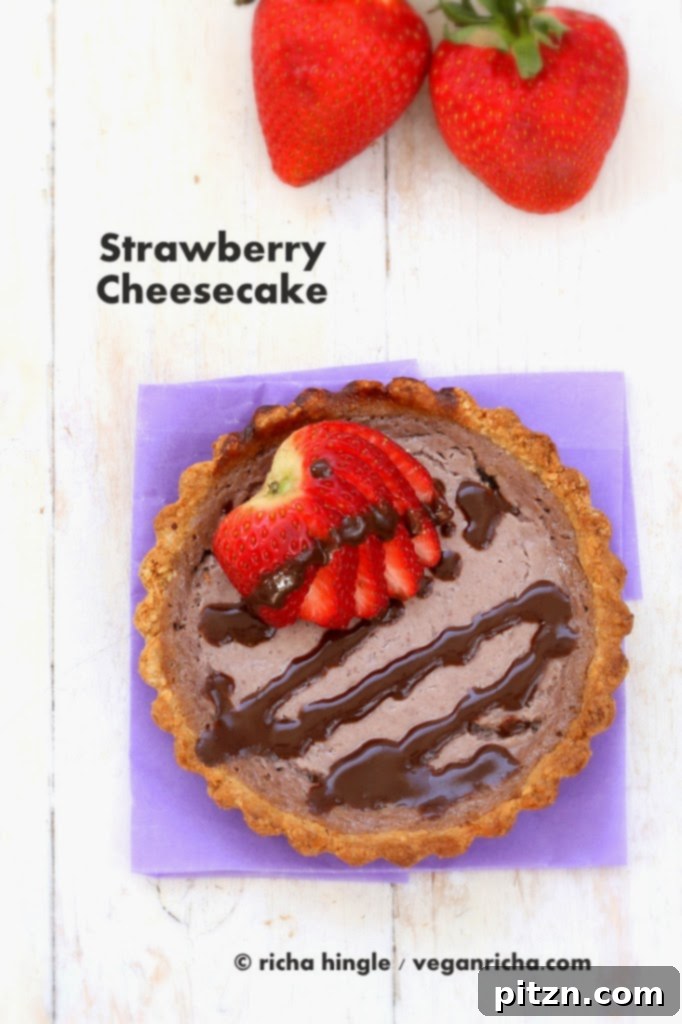 Close-up of the delicious strawberry cheesecake filling with a hint of purple hue in a gluten-free tart