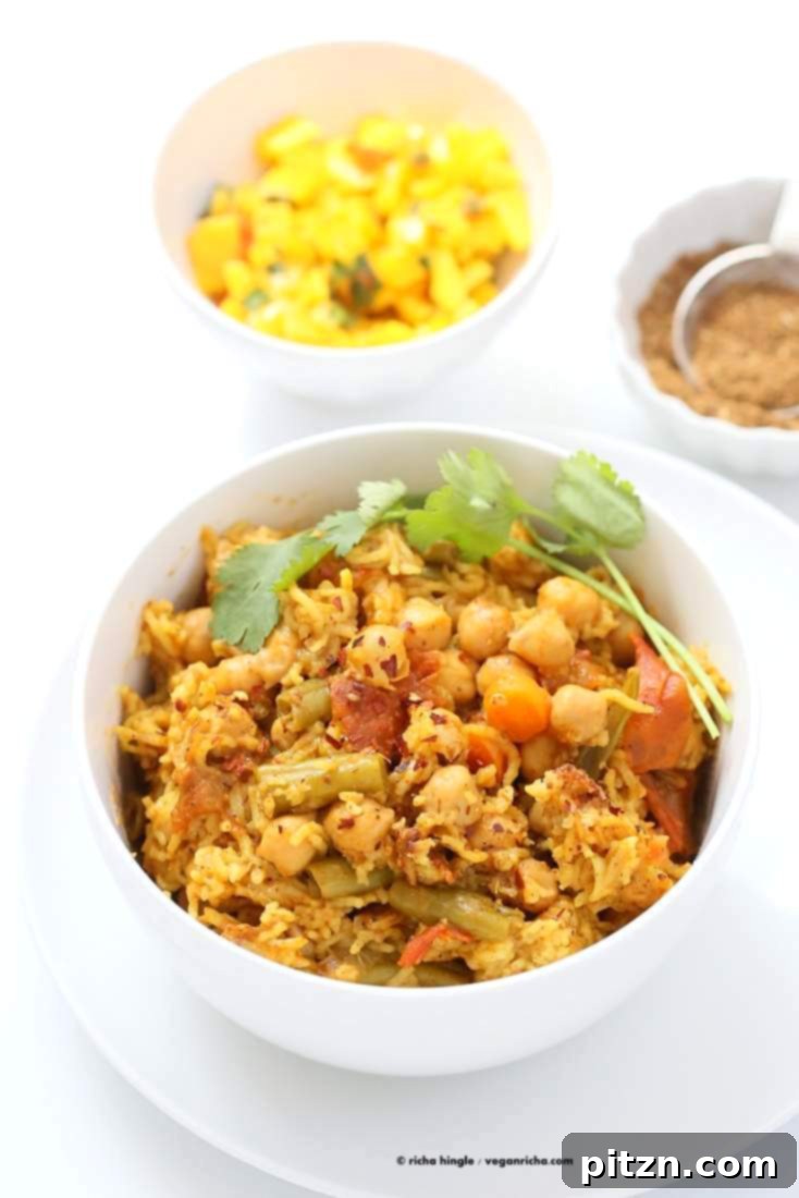 One-Pot Curried Chickpea Rice Pilaf 6 A top-down view of the Chickpea Rice Pulao, showcasing its rich texture and spices. Vegan Richa.