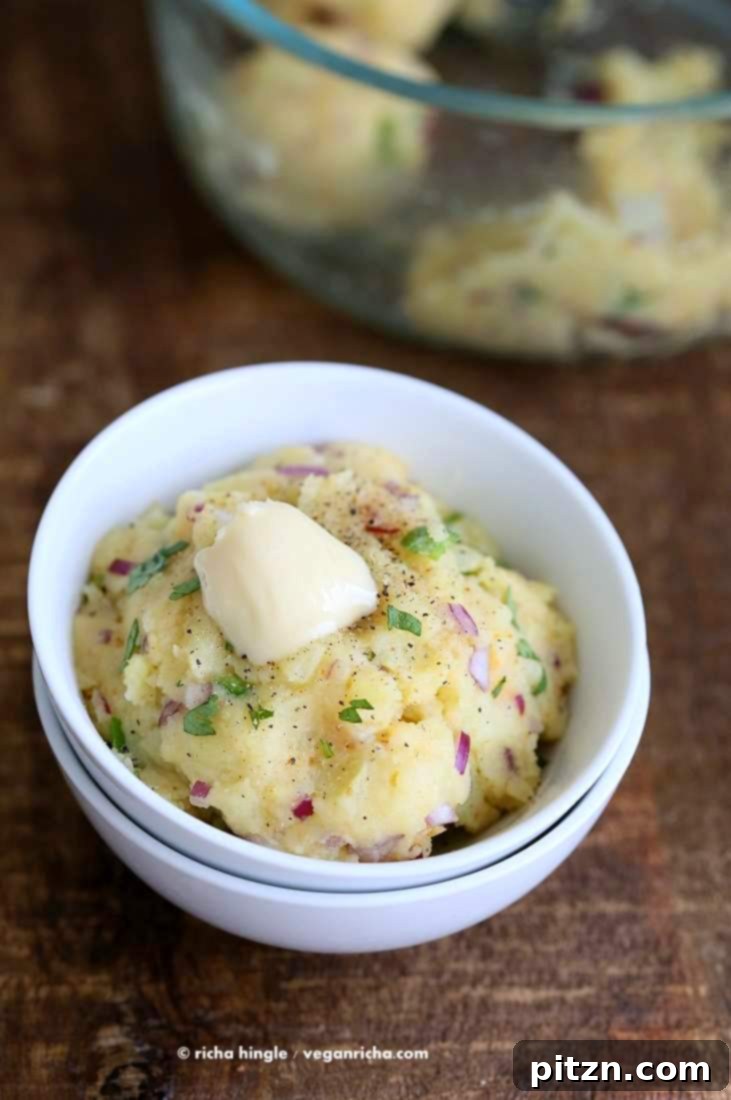 Aloo Bharta: Spiced Indian Potato Perfection 3 Aloo Bharta, spicy Indian mashed potatoes, garnished with herbs and ready to be served as a delightful side.