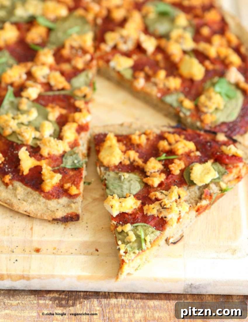 Easy Gluten Free Yeast Free Vegan Pizza Base 9 The finished Gluten-free Yeast-free Vegan Pizza, sliced and ready to serve, showcasing the sturdy, gum-free, soy-free, and nut-free crust.