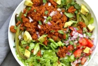 Hearty Vegan Taco Salad Bowl with Carrot-Walnut Crumbles