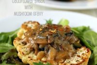 Hearty Vegan Gluten-Free Cauliflower Steaks Smothered in Mushroom Gravy