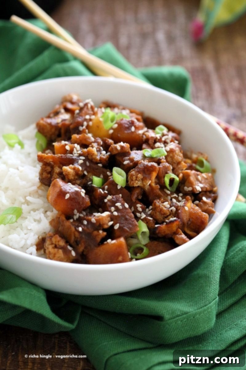 Sweet Date Teriyaki Tempeh Butternut Cauliflower 5 Appetizing close-up of Tempeh, Cauliflower, and Butternut in rich Teriyaki Sauce, ready to be enjoyed