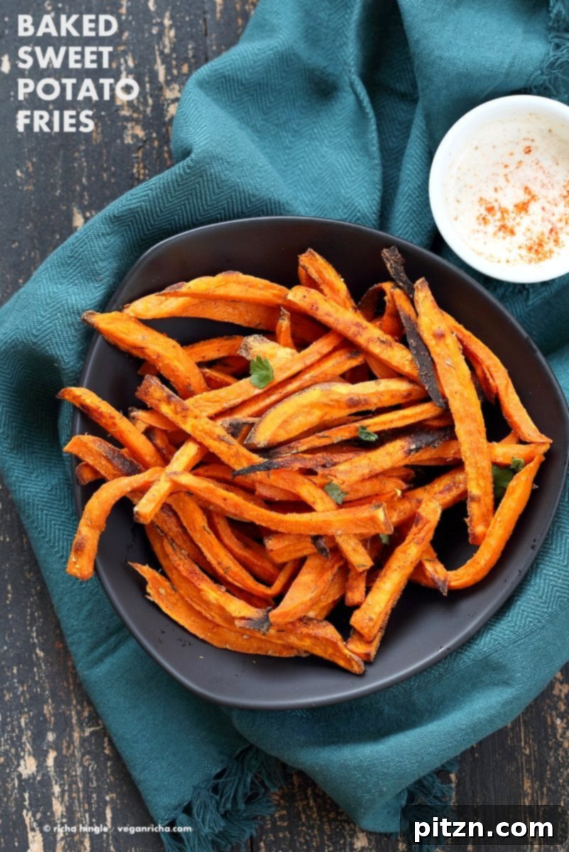 Baked Sweet Potato Fries with Vegan Chipotle Ranch in a bowl, ready to serve. Healthy, crispy, dairy-free appetizer.