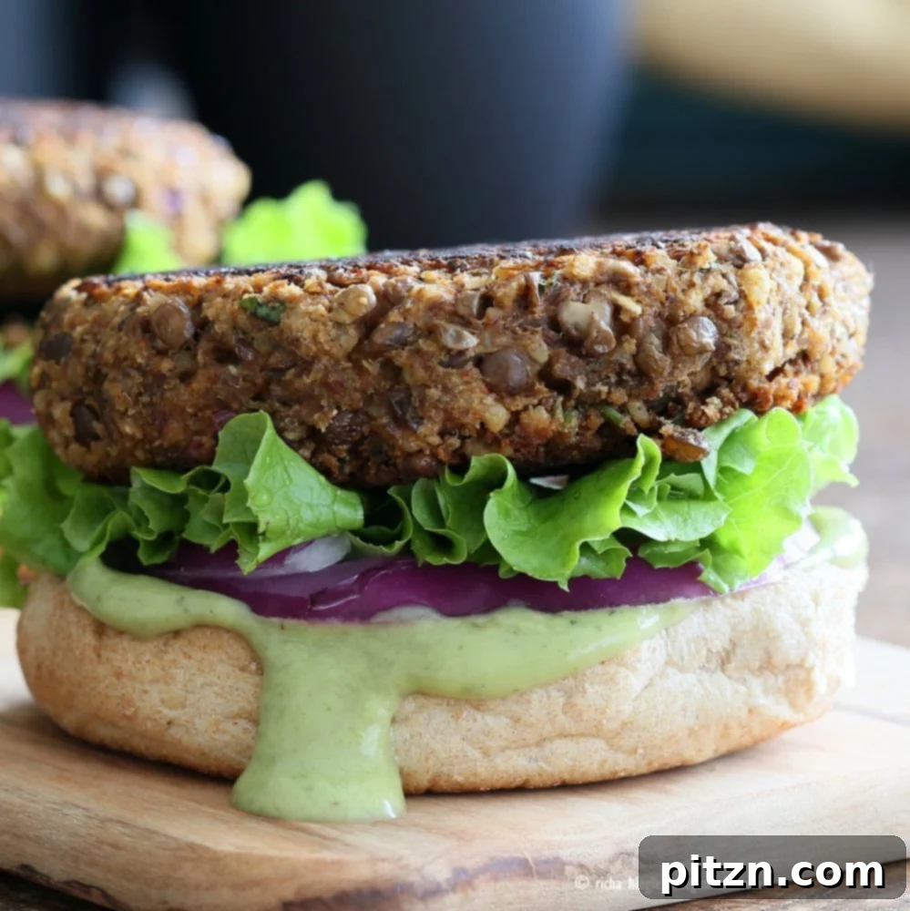 Hearty Vegan Lentil Walnut Burgers served with fresh toppings