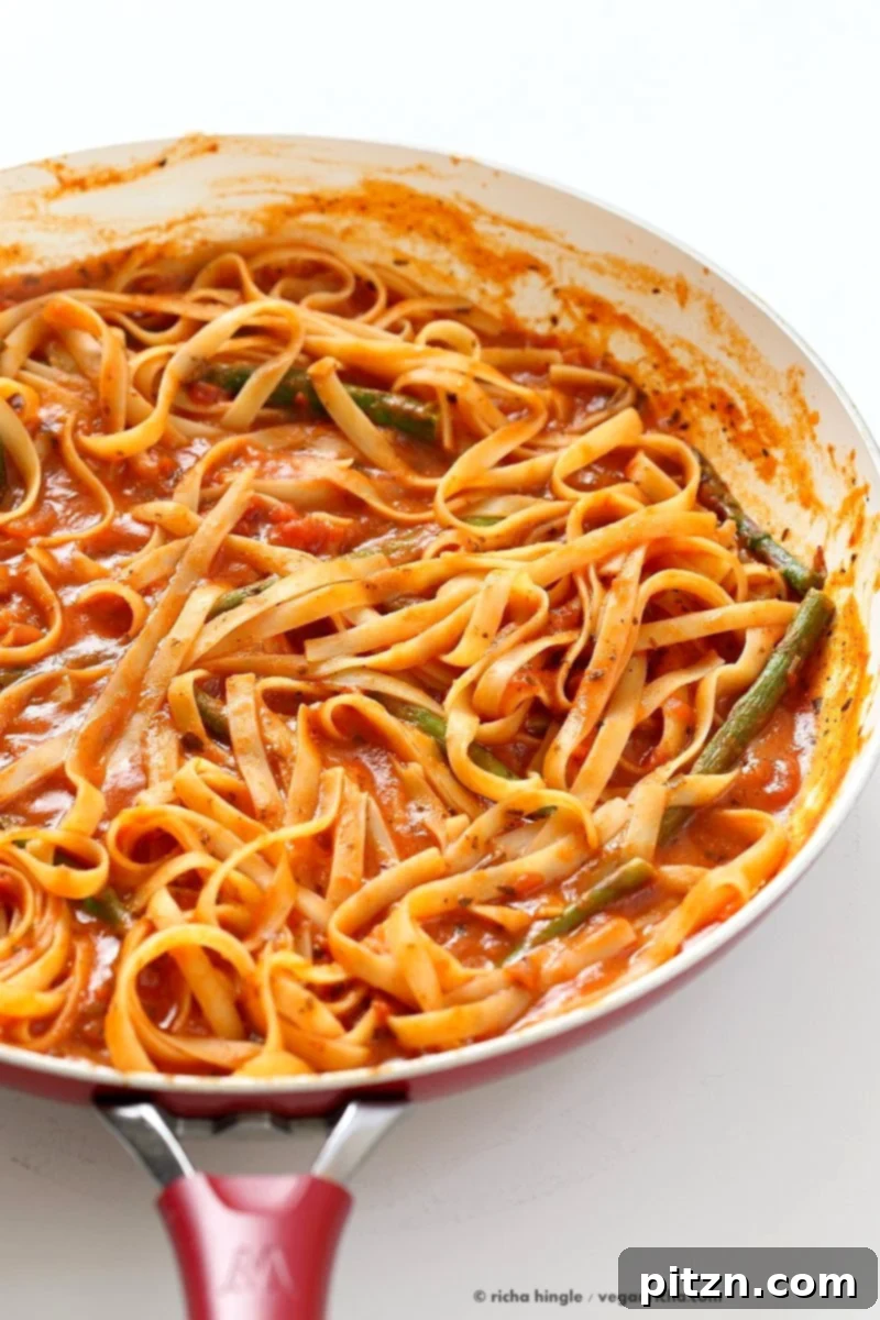 Velvety Tomato Cream Fettuccine with Asparagus 3 Fettuccine with Tomato Cream Sauce and Asparagus. Easy tomato Cream sauce with pasta and garlic roasted Asparagus. Use other veggies of choice. Add some chickpea chorizo or smoked coconut for variation. Vegan Soyfree Recipe. Can be gluten-free with gf pasta. | VeganRicha.com