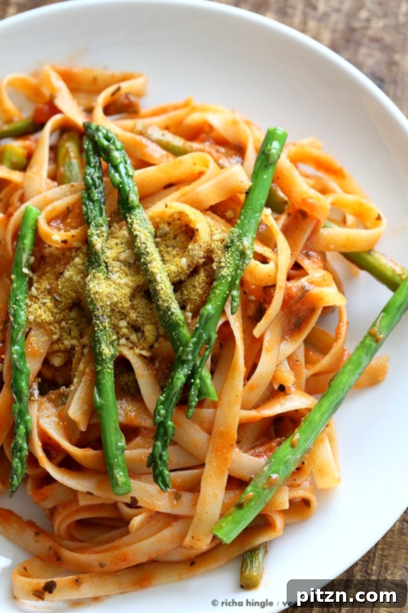 Velvety Tomato Cream Fettuccine with Asparagus 4 Fettuccine with Tomato Cream Sauce and Asparagus. Easy tomato Cream sauce with pasta and garlic roasted Asparagus. Use other veggies of choice. Add some chickpea chorizo or smoked coconut for variation. Vegan Soyfree Recipe. Can be gluten-free with gf pasta. | VeganRicha.com