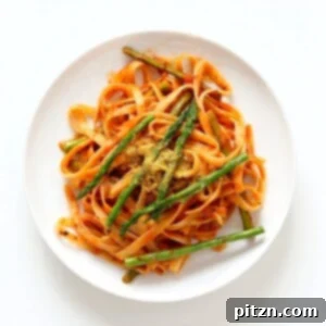 Fettuccine with Tomato Cream Sauce and Asparagus