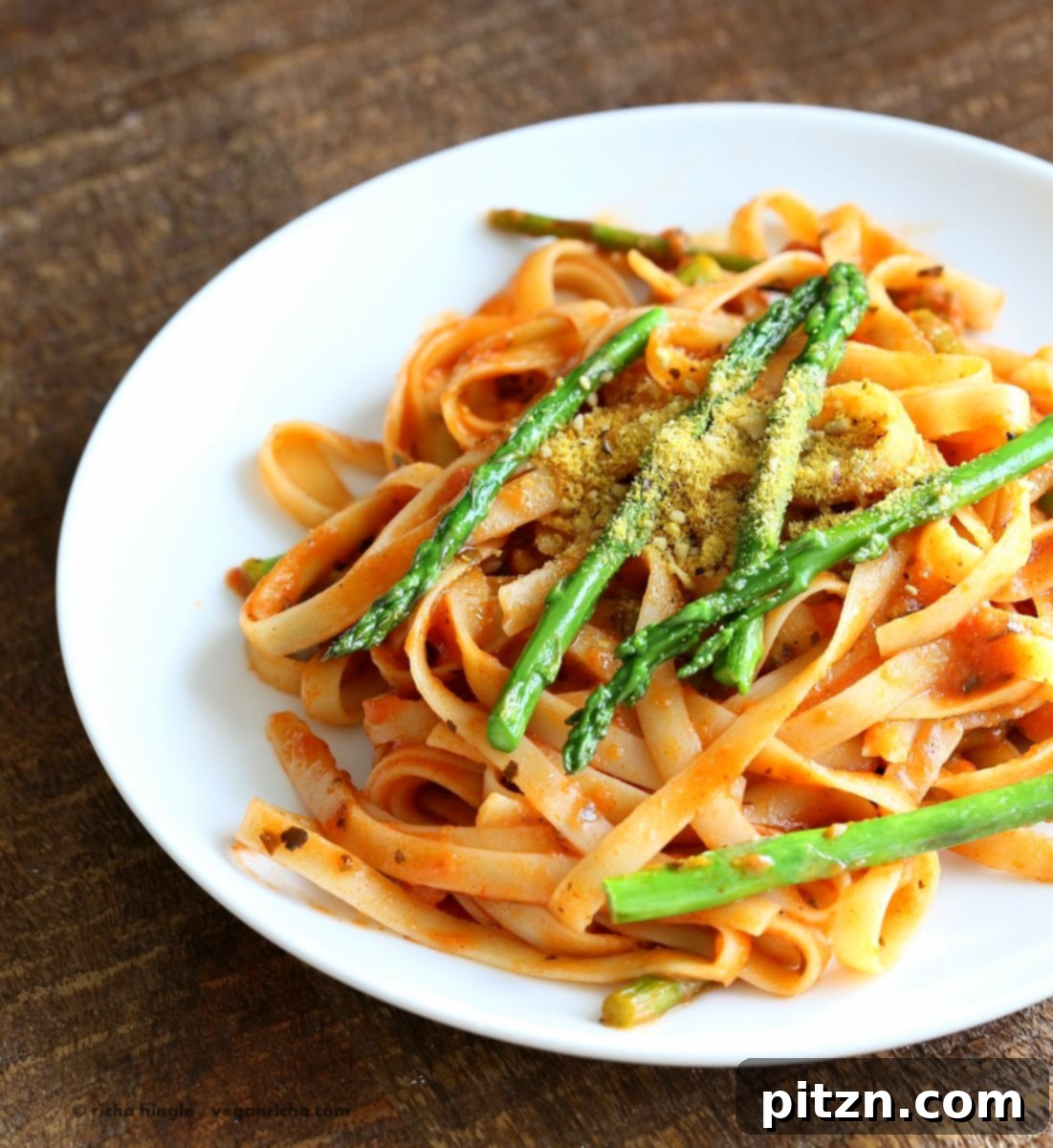 Velvety Tomato Cream Fettuccine with Asparagus 6 Fettuccine with Tomato Cream Sauce and Asparagus. Easy tomato Cream sauce with pasta and garlic roasted Asparagus. Use other veggies of choice. Add some chickpea chorizo or smoked coconut for variation. Vegan Soyfree Recipe. Can be gluten-free with gf pasta. | VeganRicha.com
