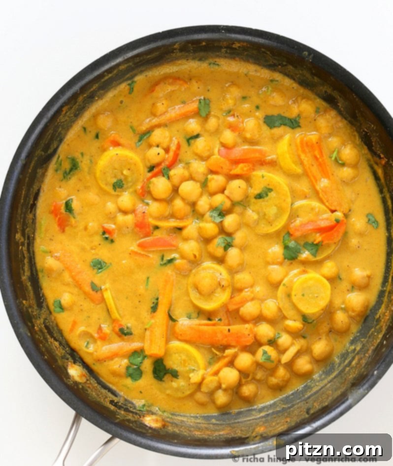 One-Pot Turmeric Peanut Butter Chickpea Curry 6 A beautifully plated serving of Chickpeas in Turmeric Peanut Butter Curry, ready to be enjoyed.