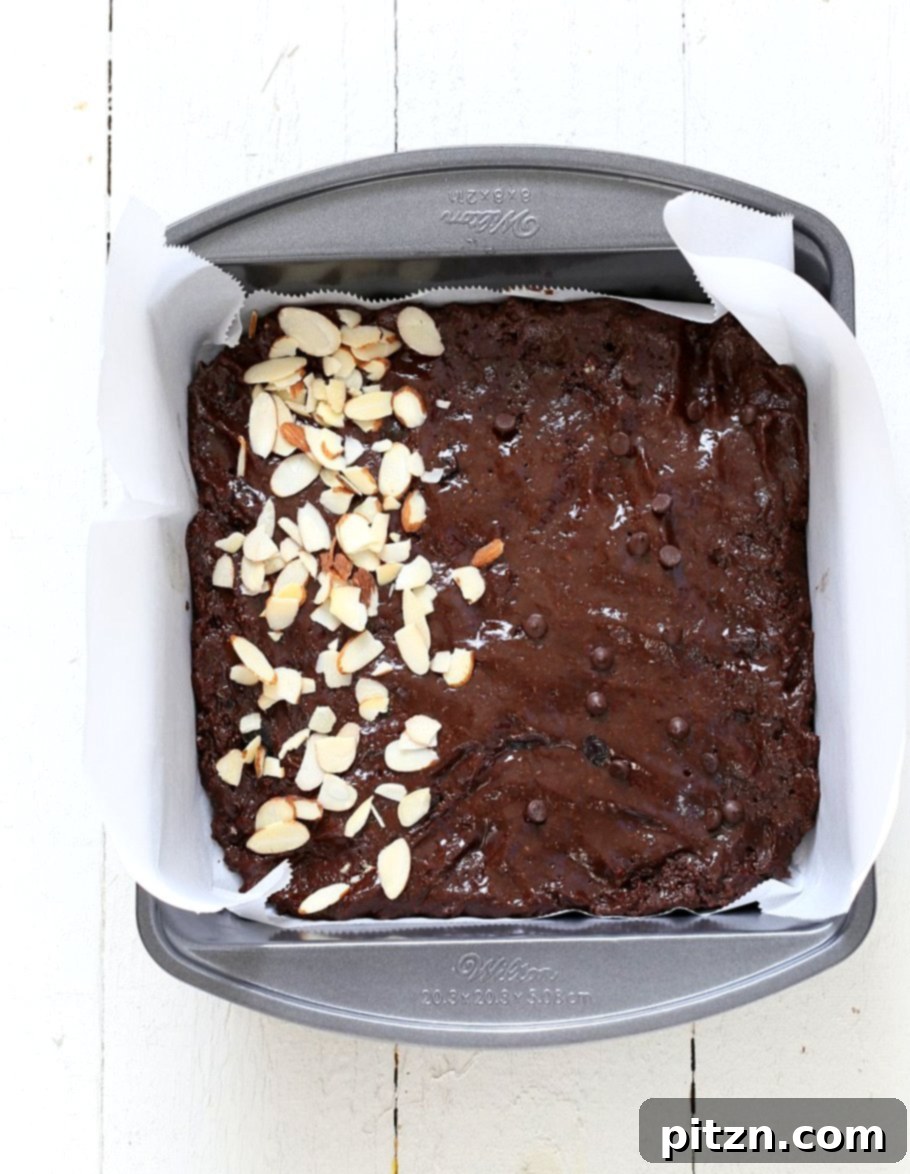 Luscious Blueberry Brownies 5 Double Blueberry Brownies. Summer Dark Chocolate Brownies with blueberries and almonds. Blueberries cooked to a compote in the wet and blueberries added with chocolate chips in the batter. Vegan Brownie Recipe. Easily made gluten-free.