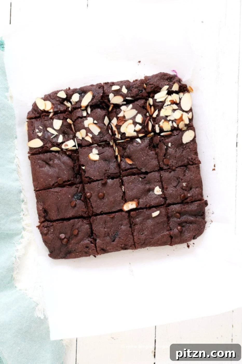 Luscious Blueberry Brownies 7 Double Blueberry Brownies. Summer Dark Chocolate Brownies with blueberries and almonds. Blueberries cooked to a compote in the wet and blueberries added with chocolate chips in the batter. Vegan Brownie Recipe. Easily made gluten-free.