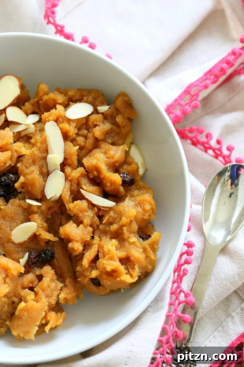 Besan Halwa, a vegan, gluten-free, and grain-free chickpea flour fudge with cardamom and nuts, perfect for festive occasions.