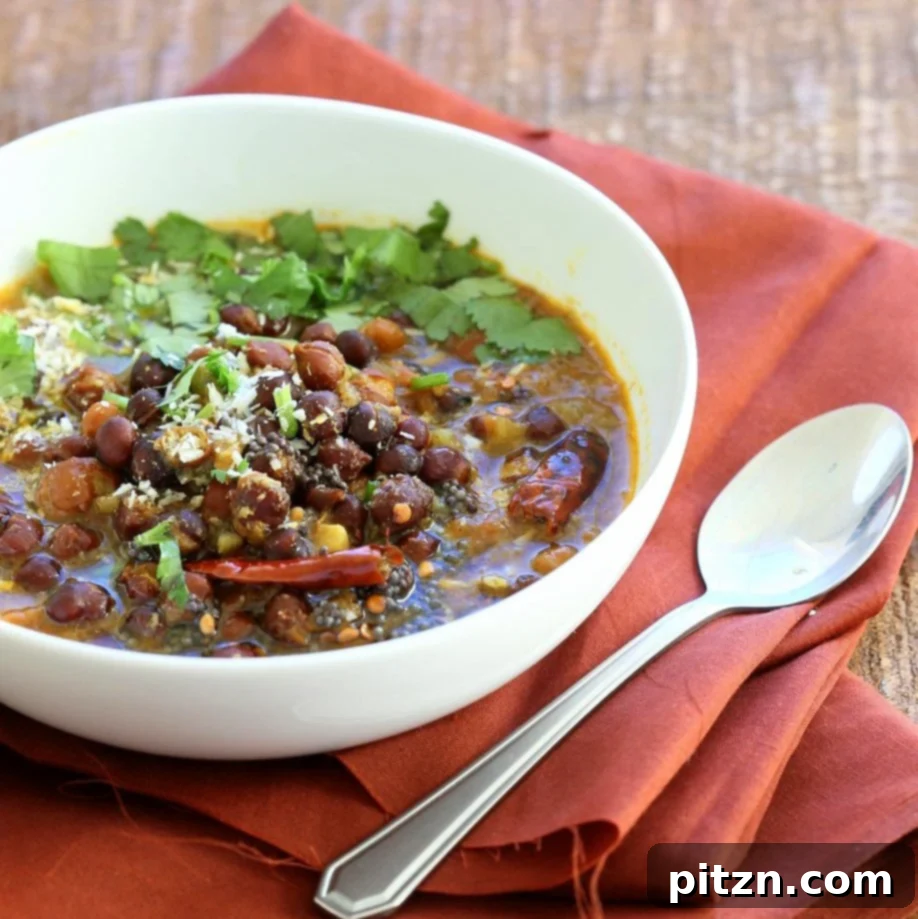 Kadala Curry - Bengal Gram or Kala Chana Curry with Coconut and Spices. Brown Chickpea Coconut Curry from South India (Kerala). Serve with rice, appams, dosas or make a bowl with roasted veggies and grains. #Vegan #Glutenfree #Soyfree #Indian #Recipe #veganricha | VeganRicha.com