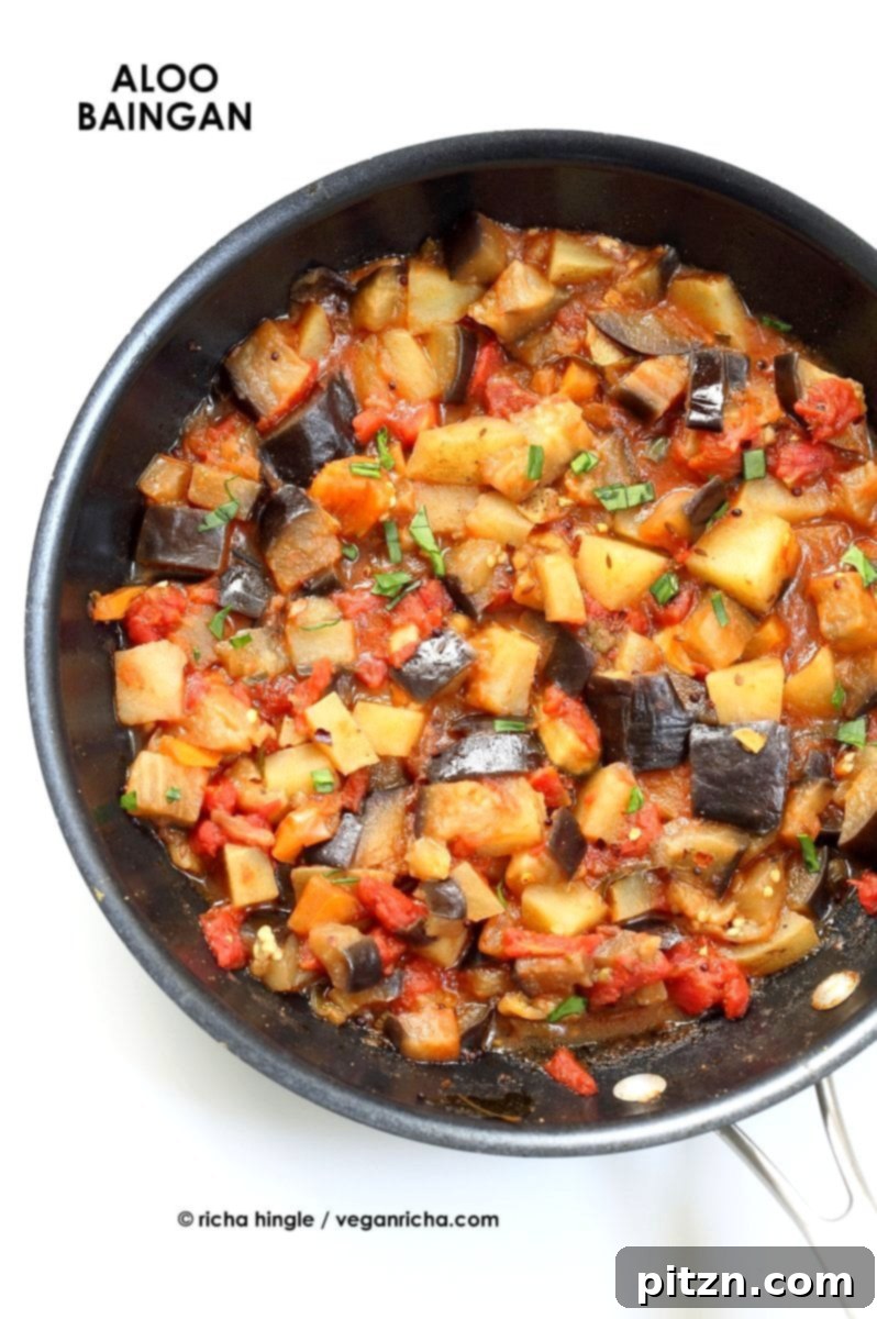 Easy Indian spiced Eggplants and Potatoes. Aloo Baingan Recipe. Curried Potato Eggplant side. | VeganRicha.com #vegan #glutenfree #Indian #eggplant #potato