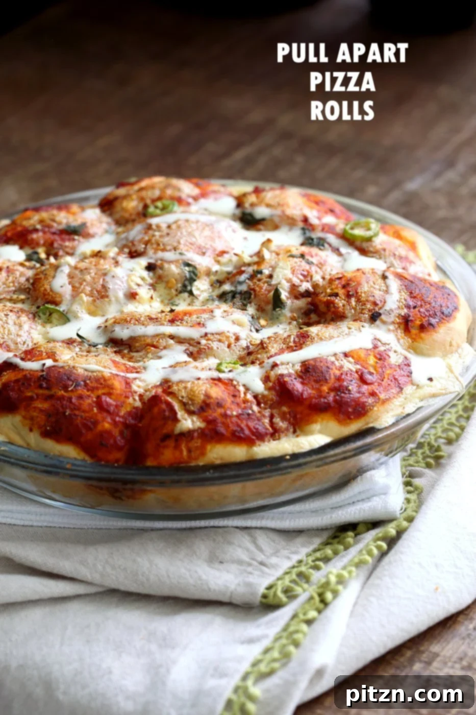 Cheesy Pizza Monkey Bread 9 Freshly baked Cheesy Pull Apart Pizza Bread, golden brown and bubbling, resting for two minutes before serving. The perfect vegan and soy-free centerpiece for any meal.