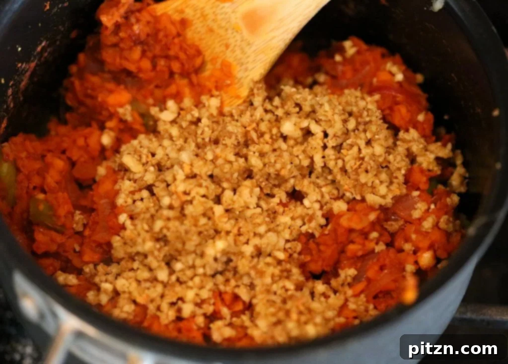 Hearty Vegan Taco Salad Bowl with Carrot-Walnut Crumbles 5 A duo of vegan taco salad bowls, one showing the full setup and another in a close-up, ready to be enjoyed.