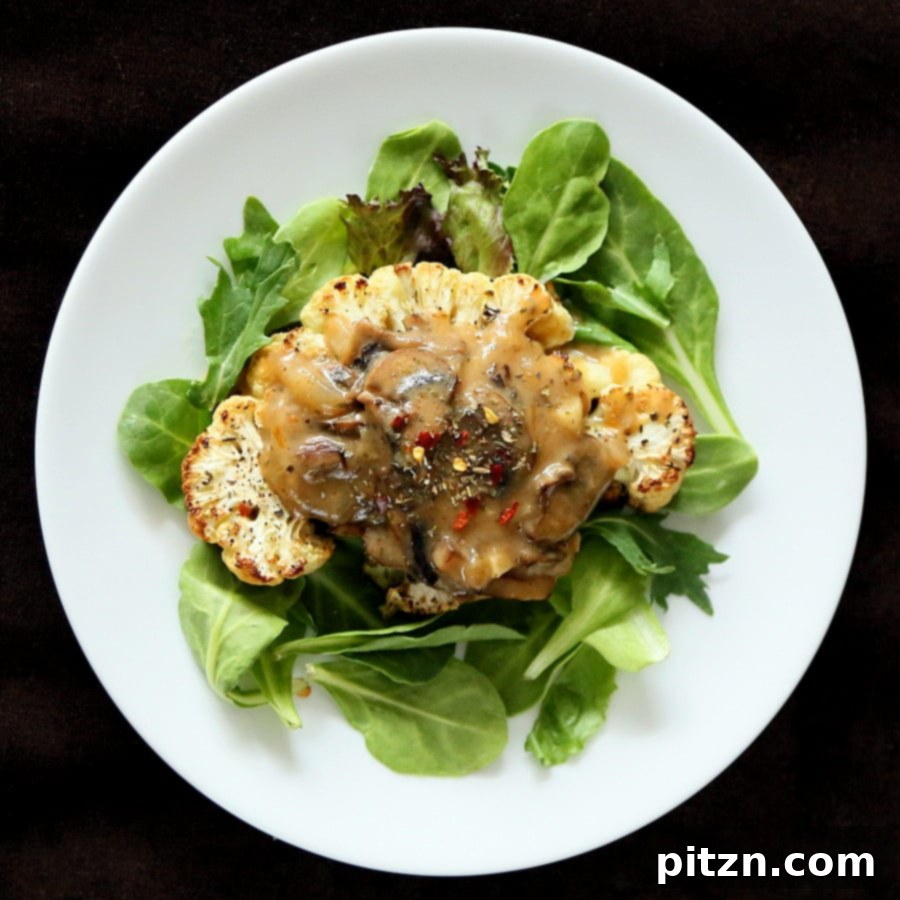 Hearty Vegan Gluten-Free Cauliflower Steaks Smothered in Mushroom Gravy 4 Cauliflower Steaks with Mushroom Gravy. Easy Roasted Cauliflower Slices served with mushroom thyme gravy. Vegan gluten-free Festive Main for the holidays. A perfect plant-based meal.