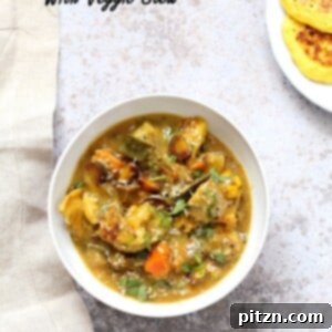 Lentil Fritters in Eggplant, Sweet Potato Coconut Stew - Bengali Inspired Chapor Ghonto. Indian Veggie Stew with Moong Dal patties. Vegan, Gluten-free, Indian Recipe.