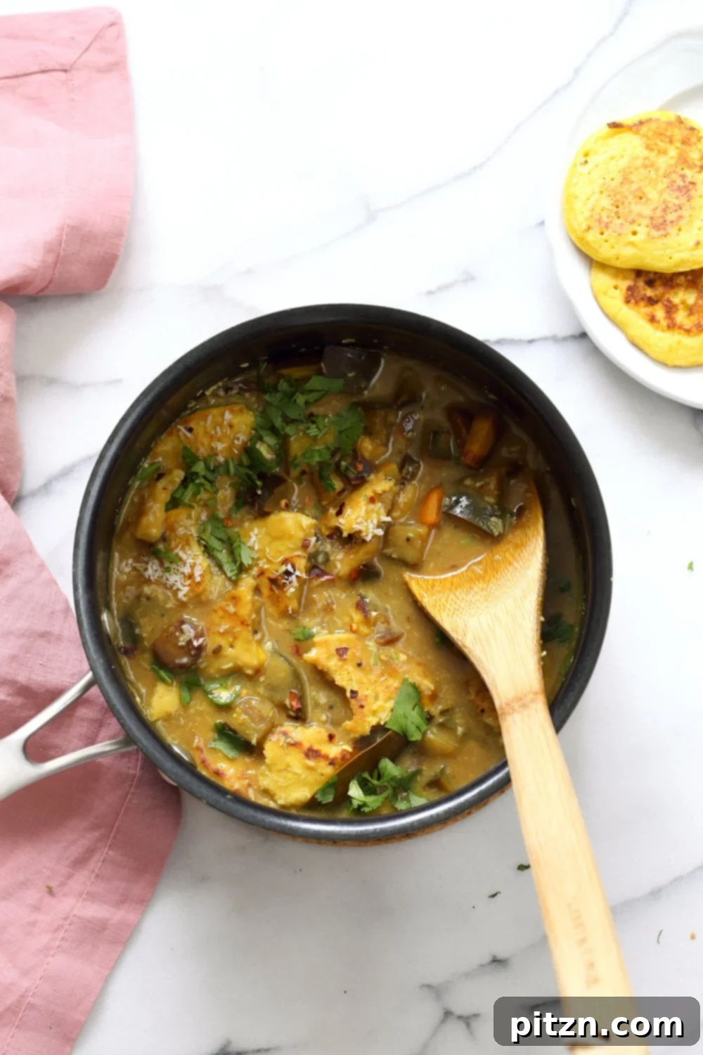 Lentil Fritters in Eggplant, Sweet Potato Coconut Stew - Bengali Inspired Chapor Ghonto. Indian Veggie Stew with Moong Dal patties. Vegan, Gluten-free, Indian Recipe.