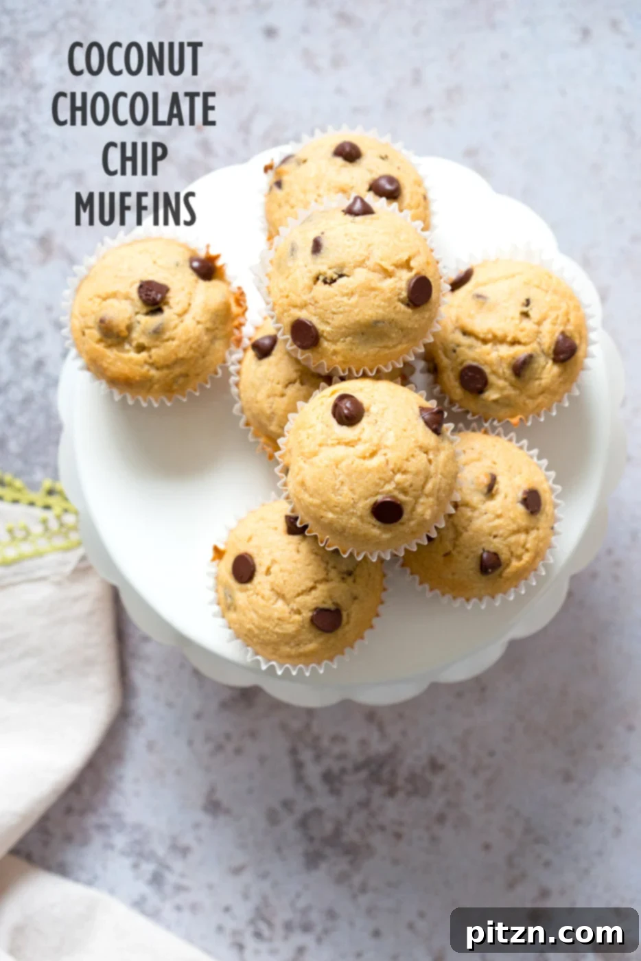Soft, moist, and utterly delicious vegan chocolate chip coconut muffins, baked to golden perfection.