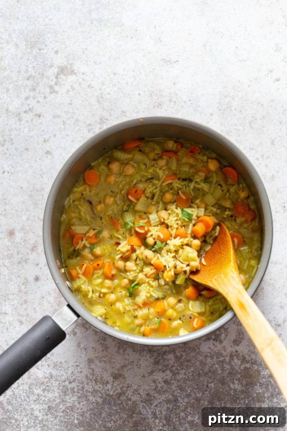 Vegan Chickpea Rice Soup in a Saucepan
