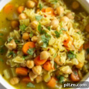 Comforting and Healing Vegan Chickpea Rice Soup with Veggies. A glutenfree variation of Vegan Chicken Noodle Soup. Easy 1 Pot 30 minute meal. #vegan #veganricha #Glutenfree #Nutfree #Recipe #Soyfreeoption