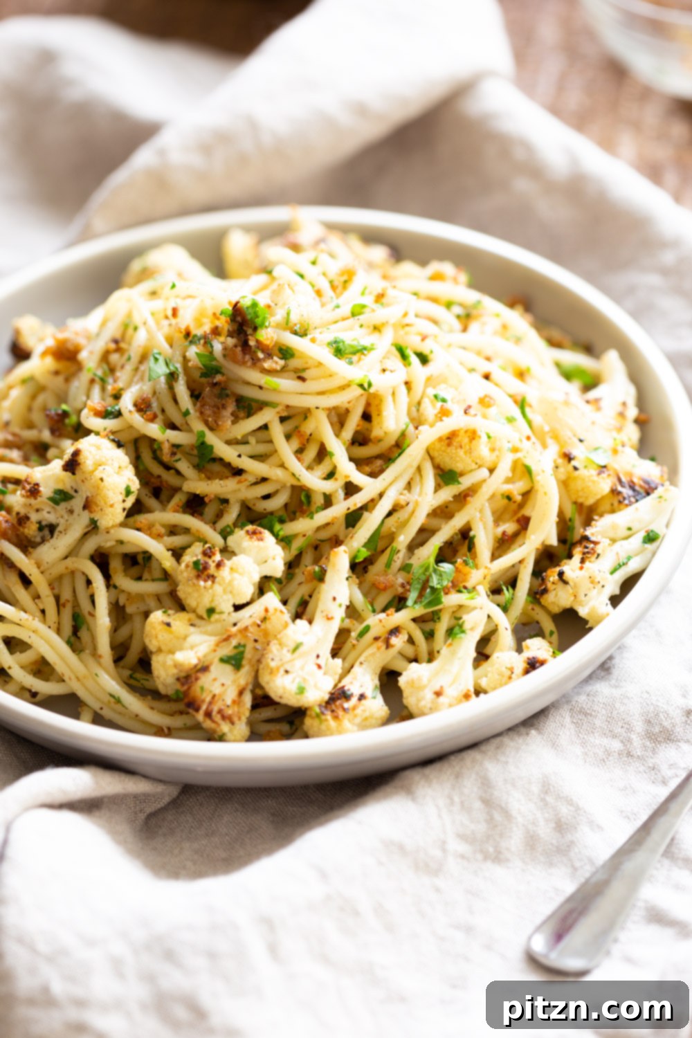 Spaghetti with Crispy Garlic Crumbs and Smoky Roasted Cauliflower 11 Easy Spaghetti with toasted garlic breadcrumbs and blistered cauliflower. Vegan Pasta with breadcrumbs, pasta wth roasted cauliflower. #Vegan #Nutfree #Soyfree #Recipe #spaghetti #toastetdbreadcrumbs #VeganRicha
