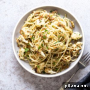 Easy Spaghetti with toasted garlic breadcrumbs and blistered cauliflower. Vegan Pasta with breadcrumbs, pasta wth roasted cauliflower.