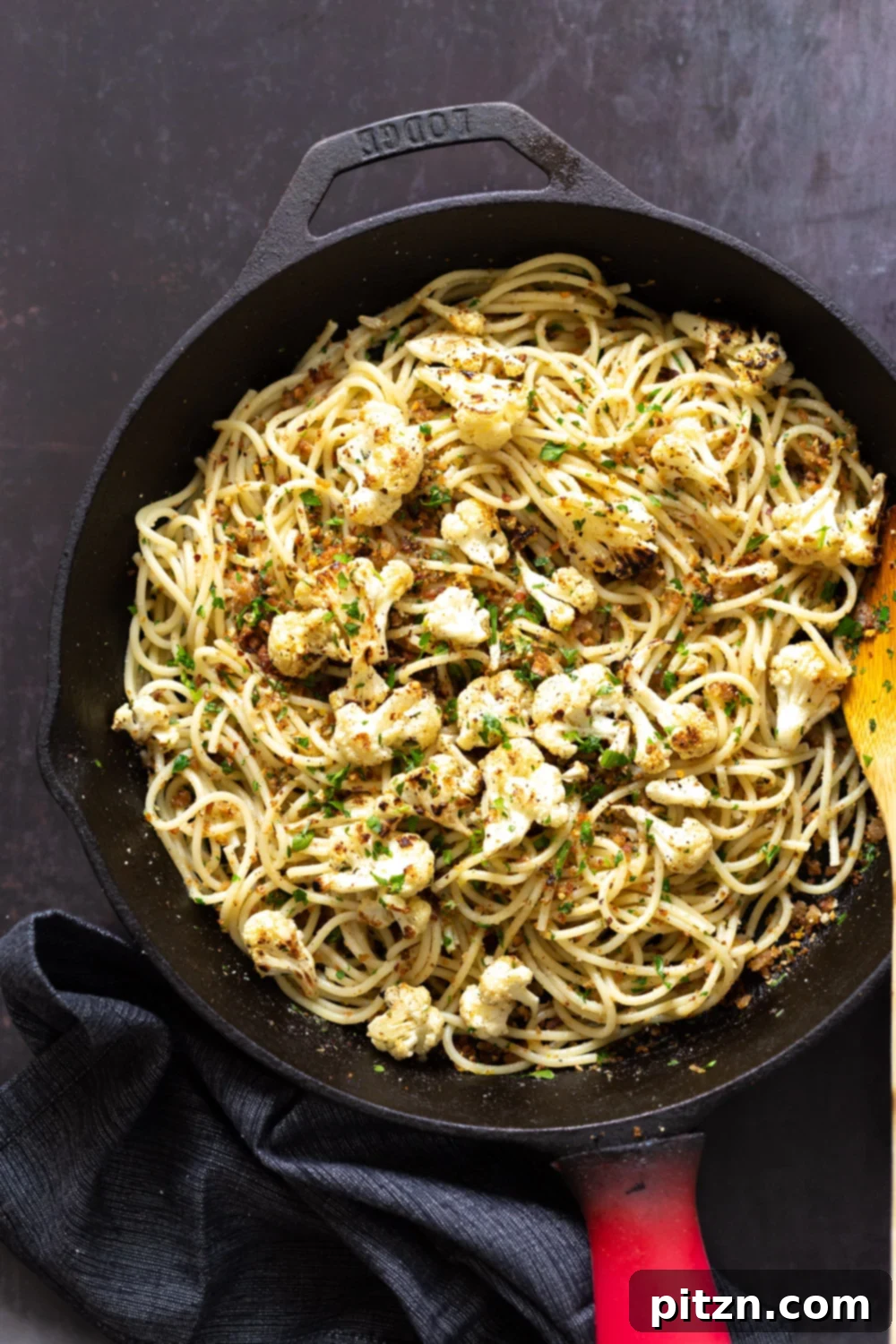 Spaghetti with Crispy Garlic Crumbs and Smoky Roasted Cauliflower 3 Spaghetti with toasted garlic breadcrumbs in a cast iron skillet