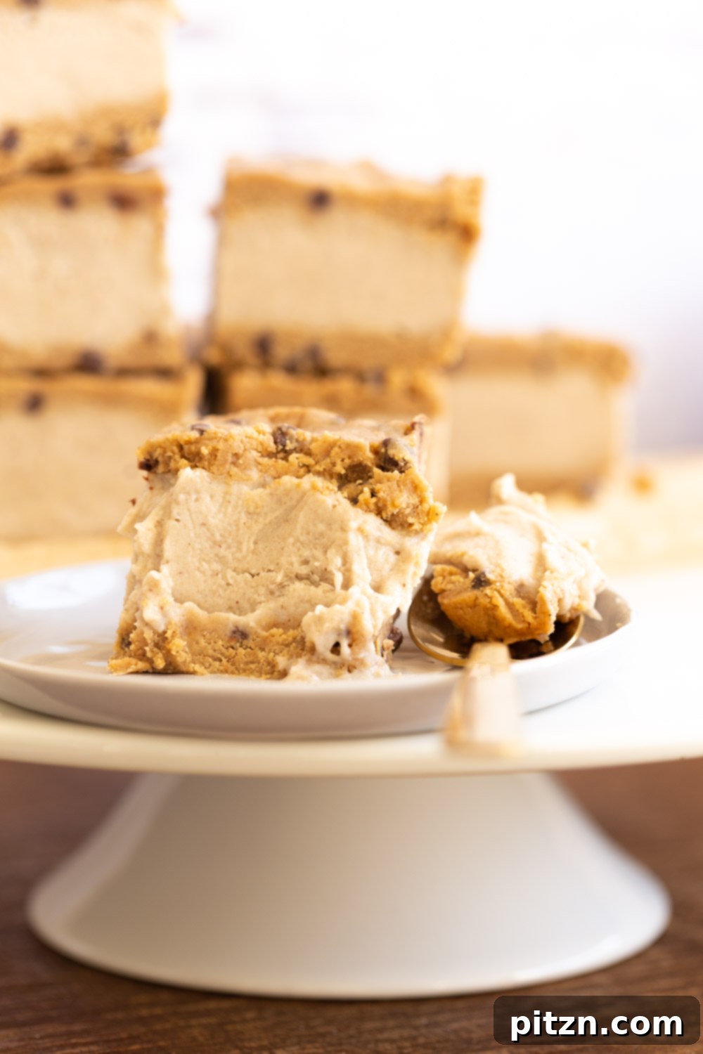 Platter of Vegan Cookie Dough Ice Cream Sandwiches on a white plate, showcasing their delightful layers