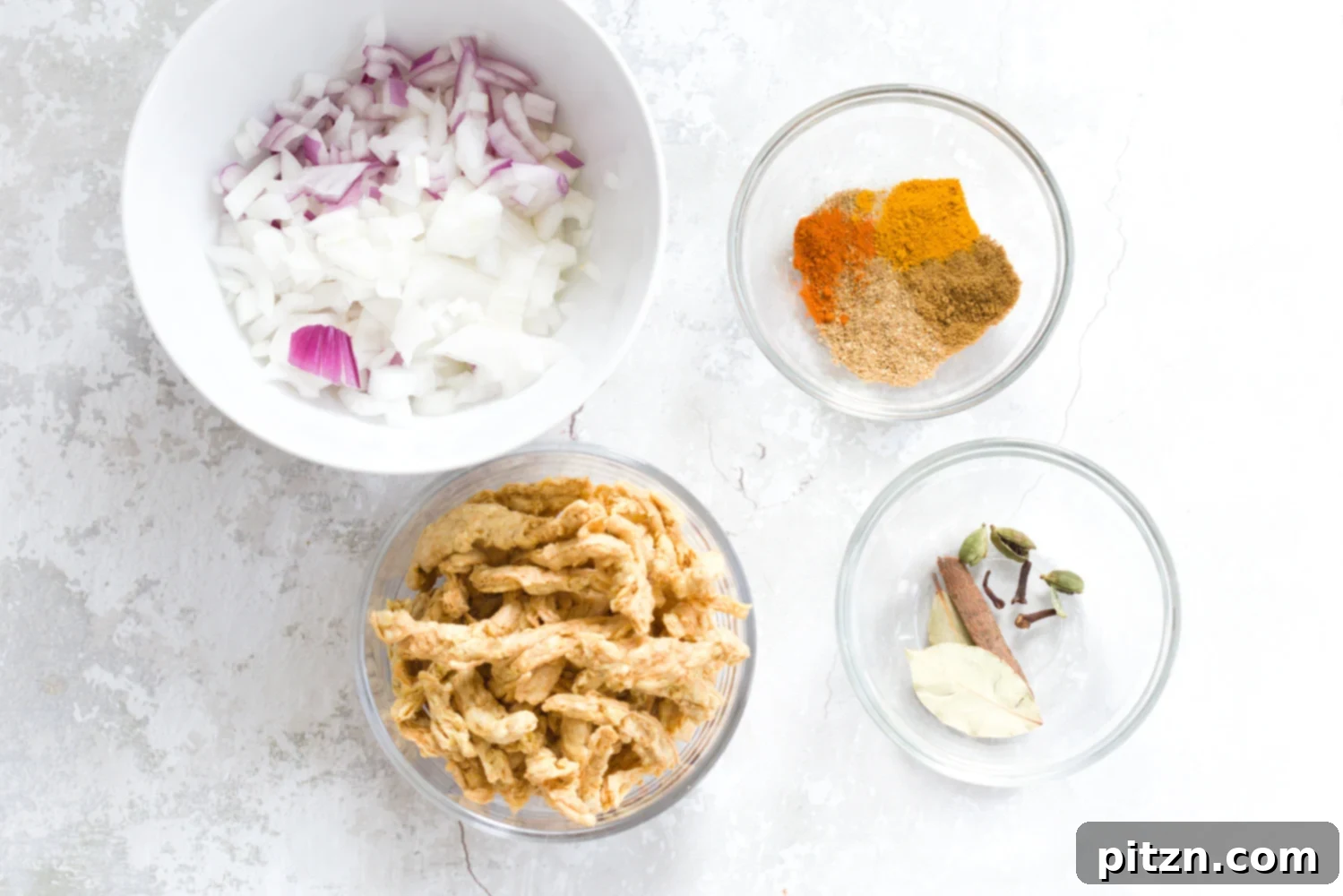 overhead shot of ingredients needed for making Instant Pot vegan methi chicken curry recipe