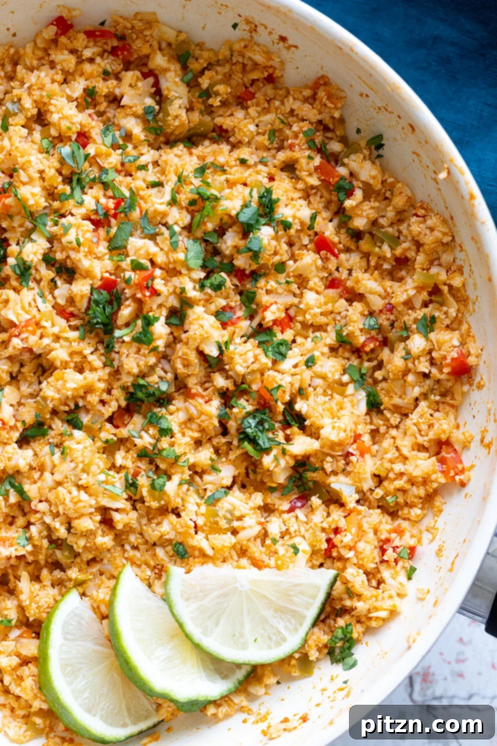 Spanish Cauliflower Rice close-up overhead shot of a frying pan with cauliflower rice