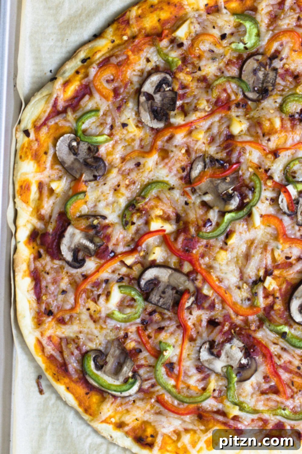 Easy Vegan Pizza Dough 2 overhead shot of half a vegan pizza