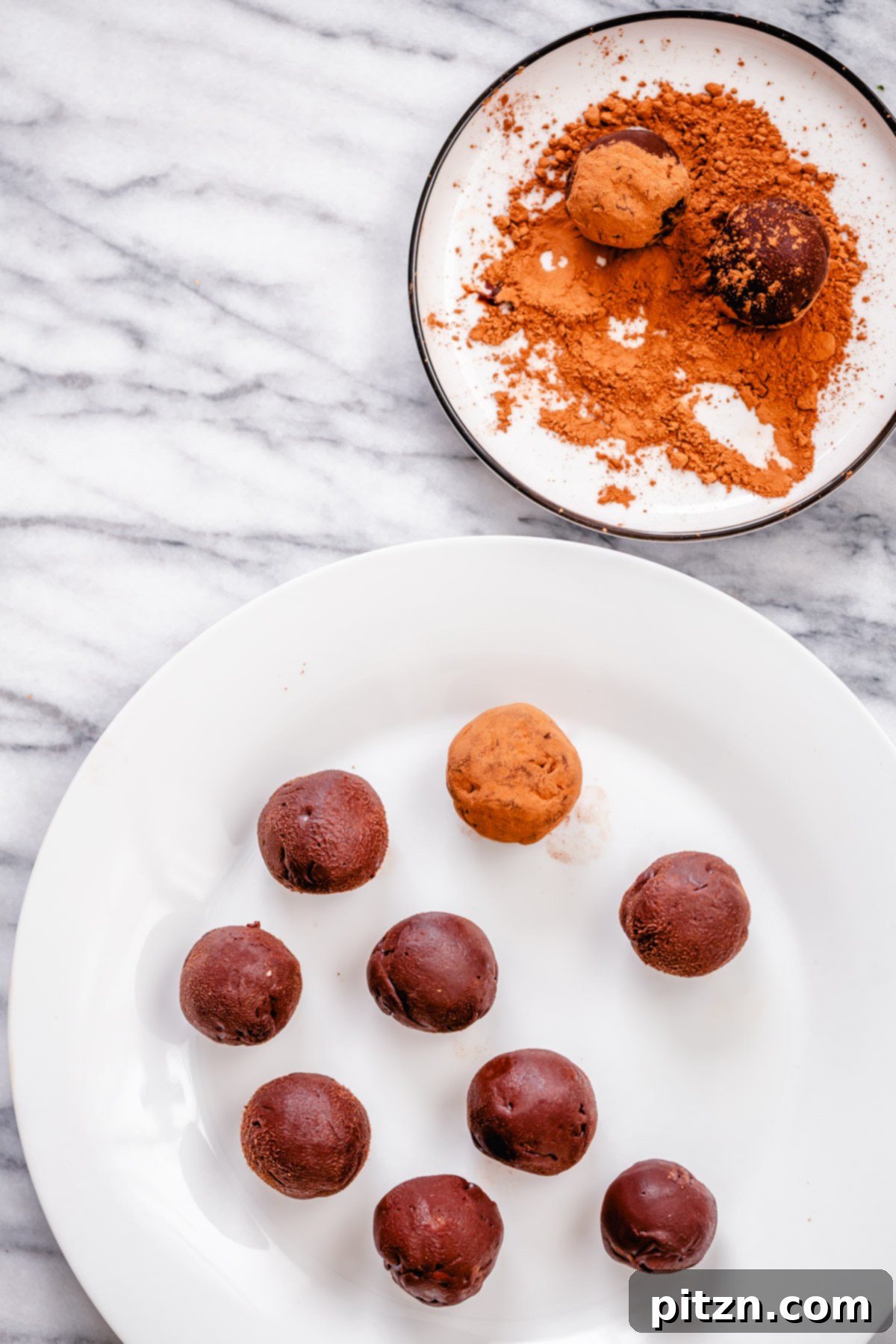 tiramisu truffles vegan tiramisu truffles being rolled in cocoa powder