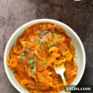 A small image of the finished vegan butter chicken lasagna.