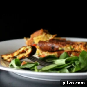A chickpea flour omelette served with a side salad