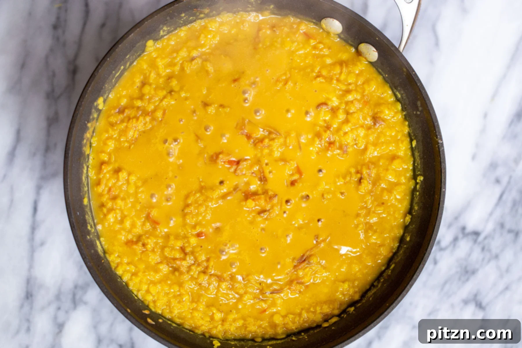 masoor dal tadka in a sauteeing pan 
