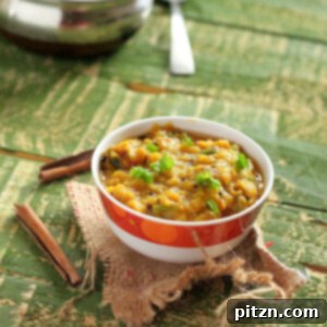 A bowl of red lentil stew, vibrant and comforting, ready to be served as a healthy, plant-based meal.